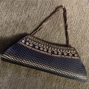 Clutch with short beaded strap